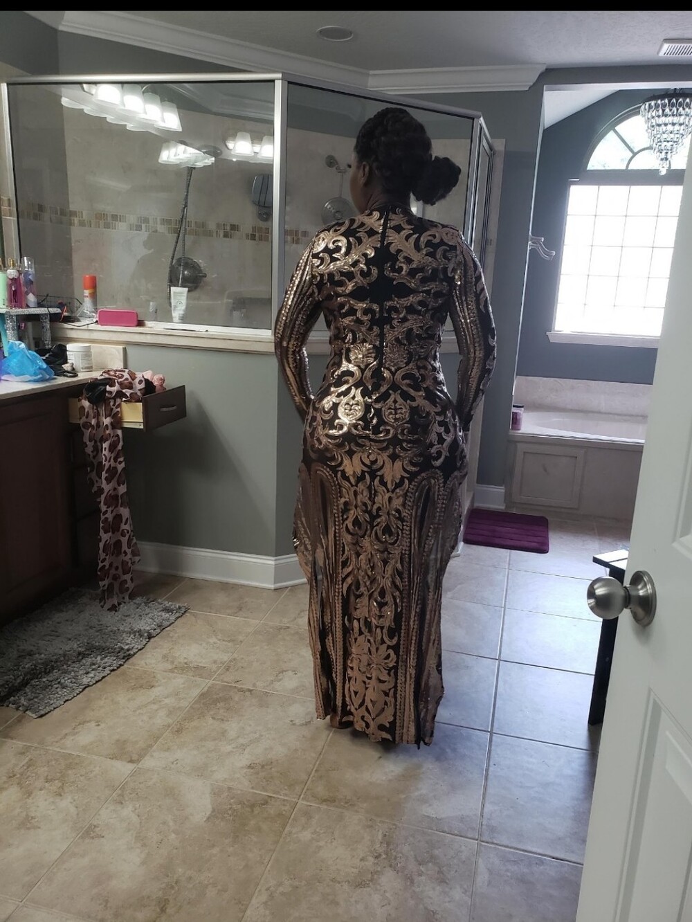 Elegant Black and Gold Sequin Evening Gown